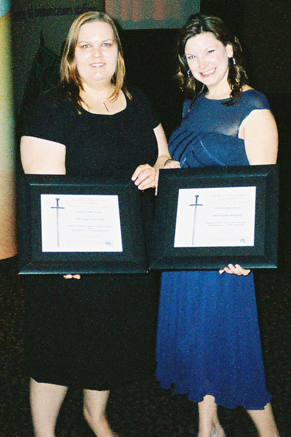   (Left to right) Jaime Napoli and Carrie Taylor accepted the Public Relations Society of America awards for media relations activities for the Coalition for Space Exploration work on behalf of Griffin Integrated Marketing.